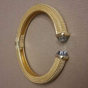 Goldtoned hinged bracelet
